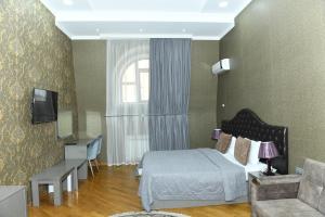 TV a/nebo společenská místnost v ubytování Prime Hotel + 42 fotografií