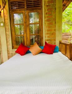 Кровать или кровати в номере Tropical Heaven +28 фотографий