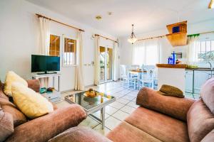 TV a/nebo společenská místnost v ubytování Villas Monte Verde -BTB