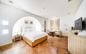 Giường trong phòng chung tại Asan Paradise +46 ảnh