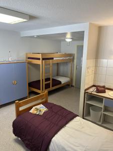 Postel nebo postele na pokoji v ubytování La Chaume