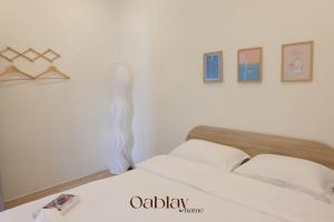 Giường trong phòng chung tại Oablay home