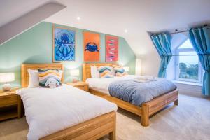 Ένα ή περισσότερα κρεβάτια σε δωμάτιο στο The Retreat - 5 Bedroom House - Horton