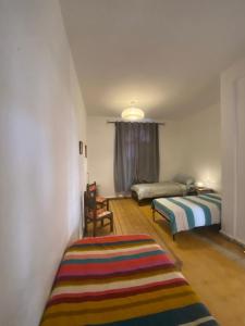 Ένα ή περισσότερα κρεβάτια σε δωμάτιο στο The BAY HOUSE