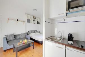 Kuchyň nebo kuchyňský kout v ubytování Elegant Studio 2P – Paris 14