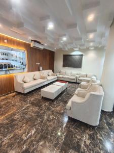 Зона вітальні в روعة أجا للشقق المخدومة