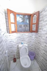 Koupelna v ubytování GK Palm Resort Watamu