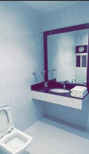 Un baño de Qasayed Hotel Salalah, فندق قصائد صلالة