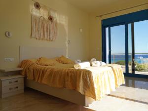 Voodi või voodid majutusasutuse VILLES RANIA toas