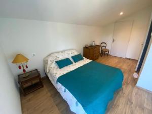 Postel nebo postele na pokoji v ubytování La grange de Tartille