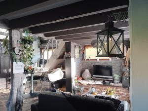 TV a/nebo společenská místnost v ubytování Holiday Home Lumassote