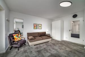 Posezení v ubytování Feel-good apartment with balcony - quiet and central