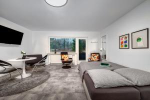 Posezení v ubytování Feel-good apartment with balcony - quiet and central