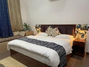 Postel nebo postele na pokoji v ubytování The Tiger Waterfront Resort