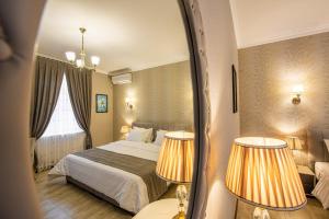 Ένα ή περισσότερα κρεβάτια σε δωμάτιο στο Eco Boutique inn +51 φωτογραφίες