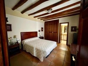 Postel nebo postele na pokoji v ubytování El Ramiral + 14 fotografií