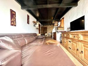 Μια τηλεόραση ή/και κέντρο ψυχαγωγίας στο Apartamento en El Hierro comodo y con Estilo