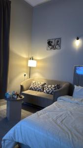 Ένα ή περισσότερα κρεβάτια σε δωμάτιο στο استديو حي البرج