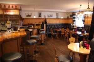 The lounge or bar area at Hotel Toni