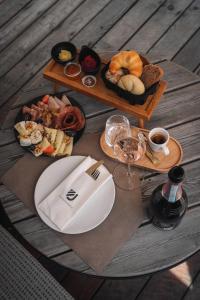 a table with a tray of different types of food at Appartements Spieljoch by Unterlercher in Fügen