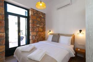 Postel nebo postele na pokoji v ubytování Stone House Edipsos + 53 fotografií