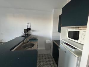 Η κουζίνα ή μικρή κουζίνα στο Appartement avec vue sur le Port du Crouesty