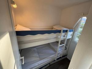 Ένα ή περισσότερα κρεβάτια σε δωμάτιο στο Appartement avec vue sur le Port du Crouesty