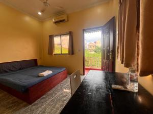 Postel nebo postele na pokoji v ubytování Babylon Angkor Hotel&Guesthouse