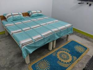 Ένα ή περισσότερα κρεβάτια σε δωμάτιο στο Shri Niwas Greh Ashraya