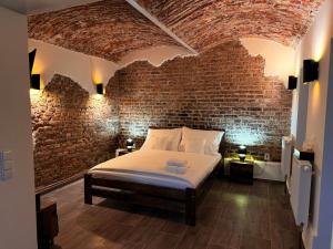 Ένα ή περισσότερα κρεβάτια σε δωμάτιο στο ADLOF Apartment