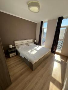 Voodi või voodid majutusasutuse Luxury South Beach Hotel toas