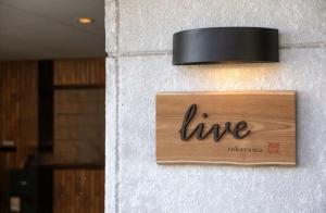 a sign that says live hanging on a wall at live takayama-Stay with a Rescue Dog and Local Host in Takayama