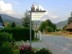 a street sign on the side of a road at Scharbachhof in Glottertal +4 photos