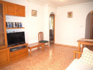 Telewizja i/lub zestaw kina domowego w obiekcie Espanhouse Diego apartment