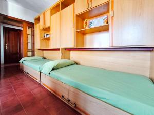 En eller flere senge i et værelse på Apartamento Canet de Mar Playa, Costa de Barcelona