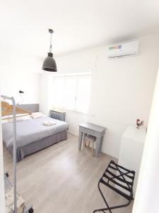 Postel nebo postele na pokoji v ubytování Rooftop Appia antica,silenzioso riservato two bedrooms two bathrooms