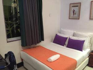 Ένα ή περισσότερα κρεβάτια σε δωμάτιο στο Villa das Mangas Garden Hotel +4 φωτογραφίες