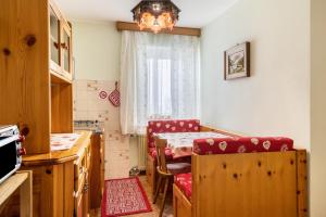 Μια τηλεόραση ή/και κέντρο ψυχαγωγίας στο Appartamento Piz Boe'