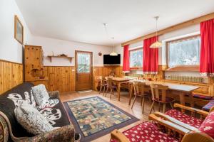 Μια τηλεόραση ή/και κέντρο ψυχαγωγίας στο Appartamento Borésc