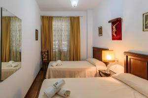 Postel nebo postele na pokoji v ubytování El Rincón Del Comendador + 16 fotografií