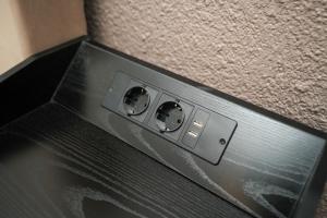 a microwave with two knobs on top of it at Shin West in Essen