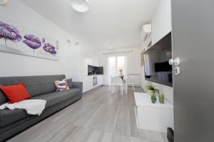 Μια τηλεόραση ή/και κέντρο ψυχαγωγίας στο Luminoso Appartamento Centrale con Spazio Esterno