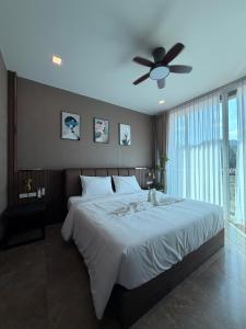 Ένα ή περισσότερα κρεβάτια σε δωμάτιο στο Me luxe hotel