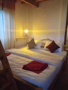 Ένα ή περισσότερα κρεβάτια σε δωμάτιο στο Wood Aura Ella