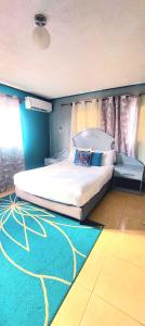 Postel nebo postele na pokoji v ubytování Central Paradise Vacation Rental