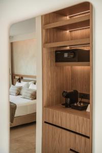 Postel nebo postele na pokoji v ubytování Mitsis Bali Paradise + 47 fotografií