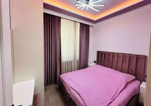 Postel nebo postele na pokoji v ubytování MoscoW