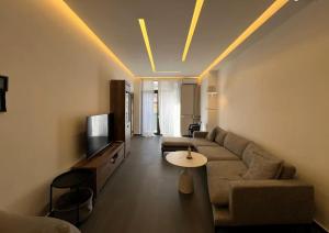 TV a/nebo společenská místnost v ubytování MoscoW