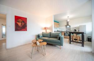 Kuchyň nebo kuchyňský kout v ubytování Le Colisée + 10 fotografií