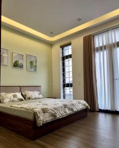 Ένα ή περισσότερα κρεβάτια σε δωμάτιο στο Dreamy homestay Huế +32 φωτογραφίες